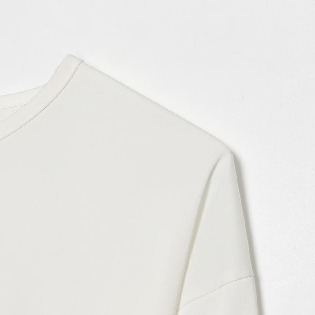 Casual style versatile long sleeve with asymmetrical splicing