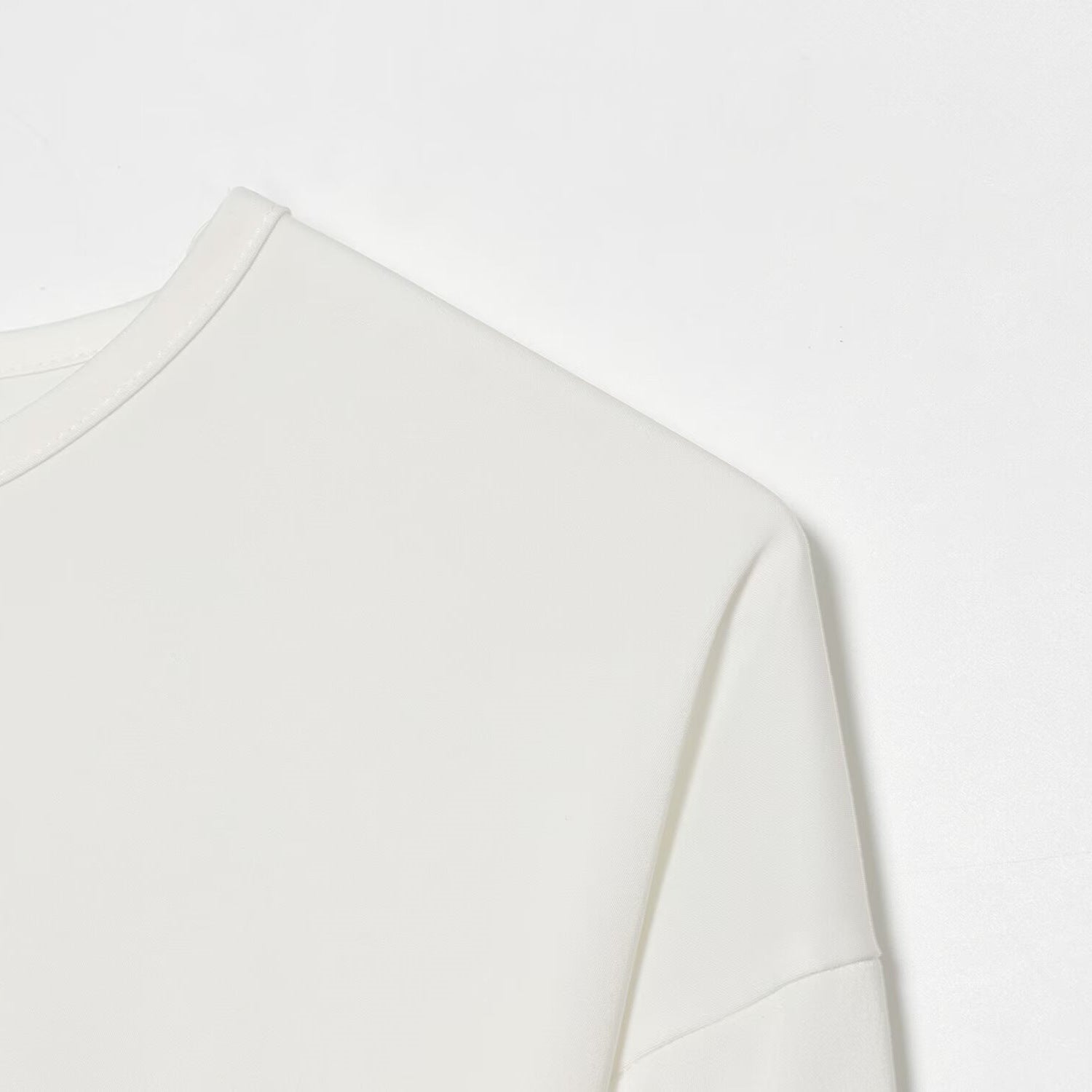 Casual style versatile long sleeve with asymmetrical splicing